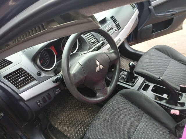 Синій Міцубісі Lancer, об'ємом двигуна 1.5 л та пробігом 439 тис. км за 5000 $, фото 5 на Automoto.ua