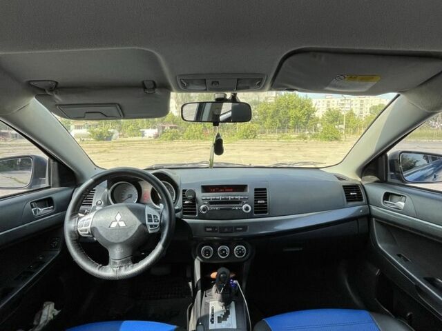 Синій Міцубісі Lancer, об'ємом двигуна 1.8 л та пробігом 195 тис. км за 6700 $, фото 7 на Automoto.ua