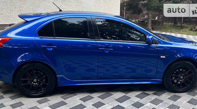 Синій Міцубісі Lancer, об'ємом двигуна 2 л та пробігом 133 тис. км за 12999 $, фото 20 на Automoto.ua