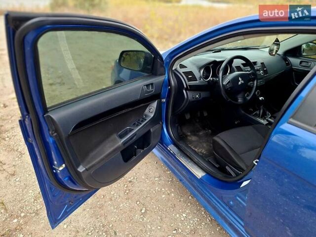 Мицубиси Лансер 2008 в Новомосковске на Automoto.ua Синий Мицубиси Лансер, объемом двигателя 1.8 л и пробегом 223 тыс. км за 4950 $, фото 12 на Automoto.ua
