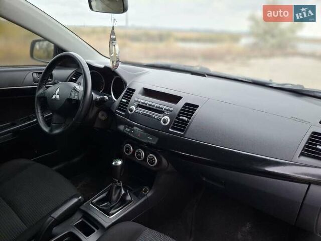 Мицубиси Лансер 2008 в Новомосковске на Automoto.ua Синий Мицубиси Лансер, объемом двигателя 1.8 л и пробегом 223 тыс. км за 4950 $, фото 7 на Automoto.ua