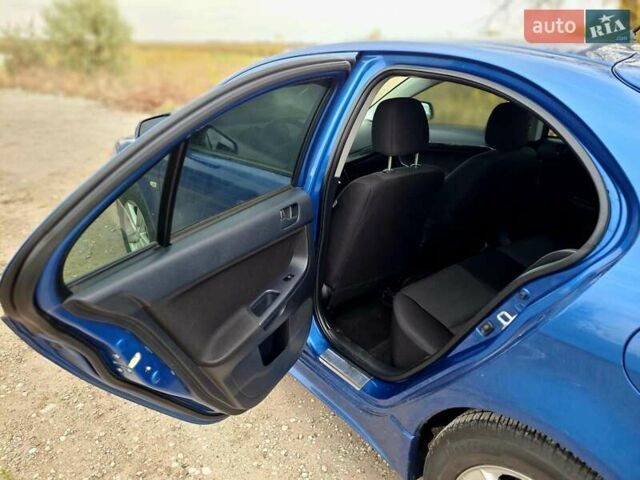Мицубиси Лансер 2008 в Новомосковске на Automoto.ua Синий Мицубиси Лансер, объемом двигателя 1.8 л и пробегом 223 тыс. км за 4950 $, фото 10 на Automoto.ua