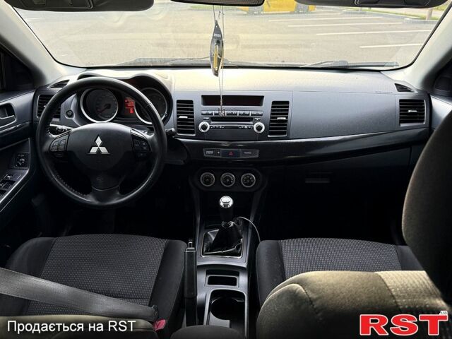 Синій Міцубісі Lancer, об'ємом двигуна 1.8 л та пробігом 222 тис. км за 4750 $, фото 5 на Automoto.ua