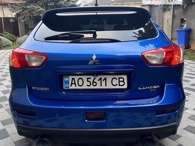 Синій Міцубісі Lancer, об'ємом двигуна 2 л та пробігом 133 тис. км за 12999 $, фото 23 на Automoto.ua