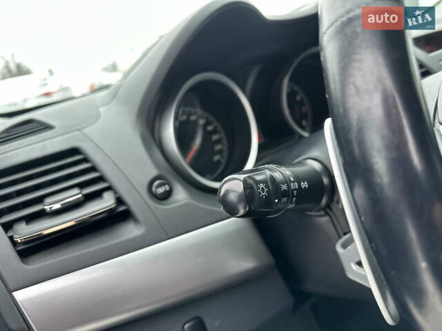 Синій Міцубісі Lancer, об'ємом двигуна 1.8 л та пробігом 141 тис. км за 7200 $, фото 20 на Automoto.ua