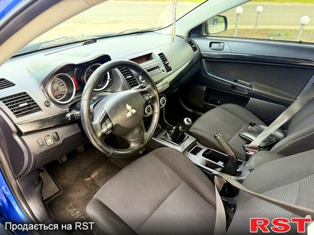Синій Міцубісі Lancer, об'ємом двигуна 1.8 л та пробігом 222 тис. км за 4750 $, фото 6 на Automoto.ua