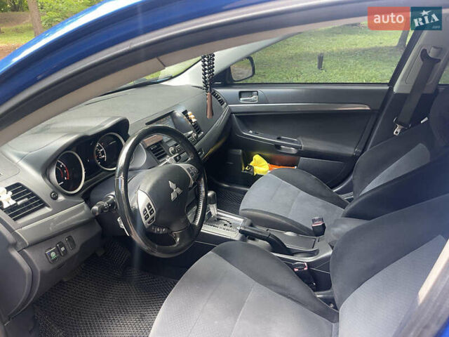 Синий Мицубиси Лансер, объемом двигателя 2.36 л и пробегом 320 тыс. км за 7700 $, фото 11 на Automoto.ua