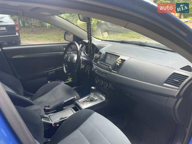 Синій Міцубісі Lancer, об'ємом двигуна 2.4 л та пробігом 320 тис. км за 7700 $, фото 6 на Automoto.ua