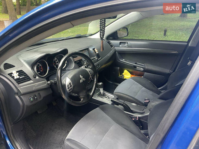 Синий Мицубиси Лансер, объемом двигателя 2.36 л и пробегом 320 тыс. км за 7700 $, фото 7 на Automoto.ua