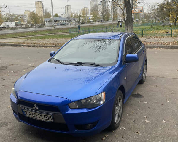 Синій Міцубісі Lancer, об'ємом двигуна 1.8 л та пробігом 133 тис. км за 8900 $, фото 14 на Automoto.ua