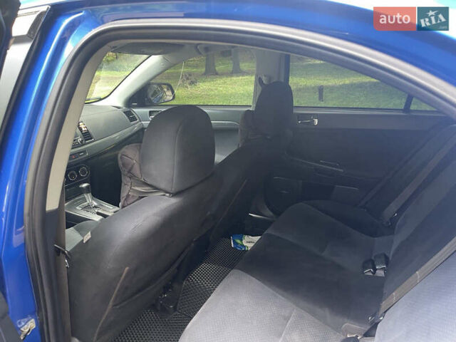 Синий Мицубиси Лансер, объемом двигателя 2.36 л и пробегом 320 тыс. км за 7700 $, фото 10 на Automoto.ua