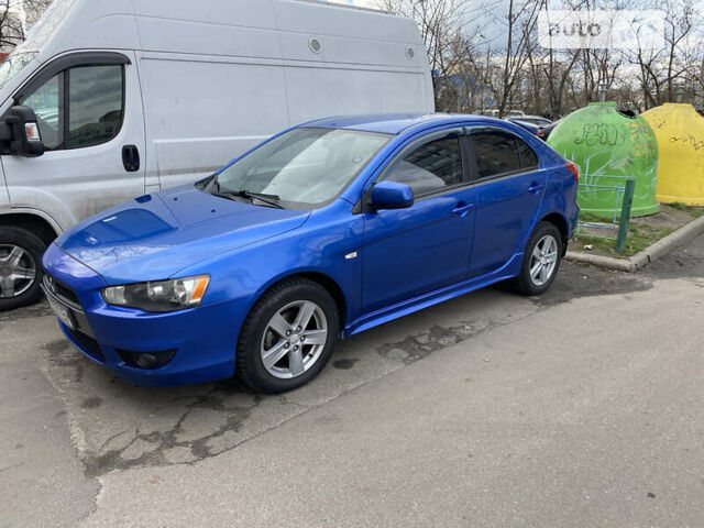 Синій Міцубісі Lancer, об'ємом двигуна 1.8 л та пробігом 133 тис. км за 8900 $, фото 13 на Automoto.ua