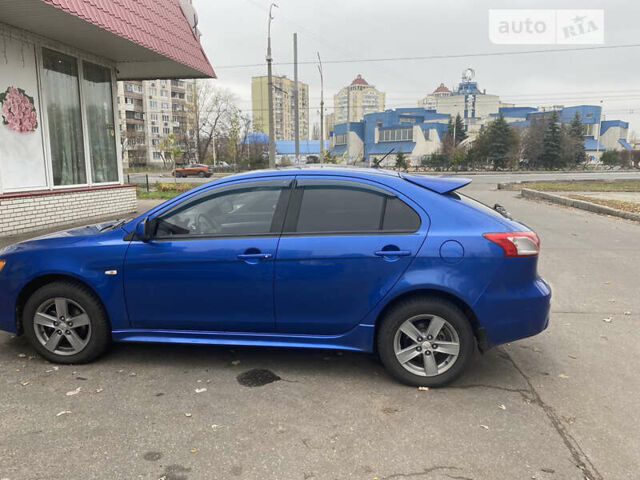 Синій Міцубісі Lancer, об'ємом двигуна 1.8 л та пробігом 133 тис. км за 8900 $, фото 17 на Automoto.ua