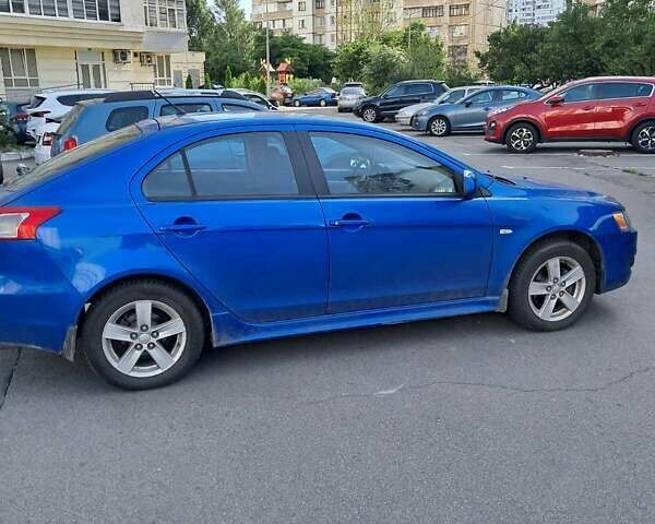 Синий Мицубиси Лансер, объемом двигателя 1.8 л и пробегом 140 тыс. км за 7000 $, фото 1 на Automoto.ua