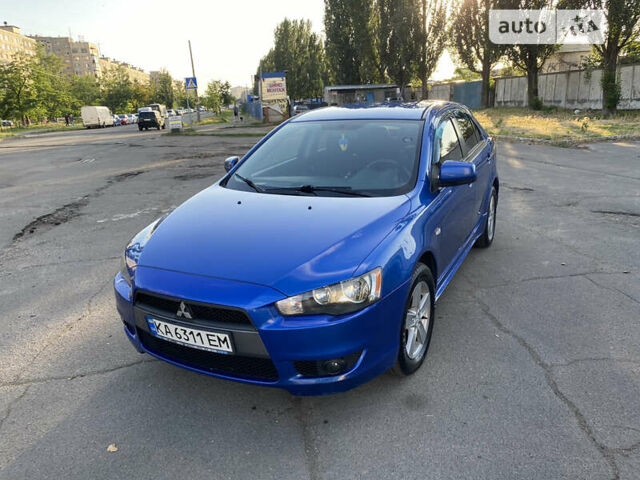 Синій Міцубісі Lancer, об'ємом двигуна 1.8 л та пробігом 133 тис. км за 8900 $, фото 1 на Automoto.ua