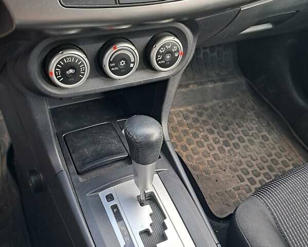 Синий Мицубиси Лансер, объемом двигателя 1.8 л и пробегом 140 тыс. км за 7000 $, фото 9 на Automoto.ua