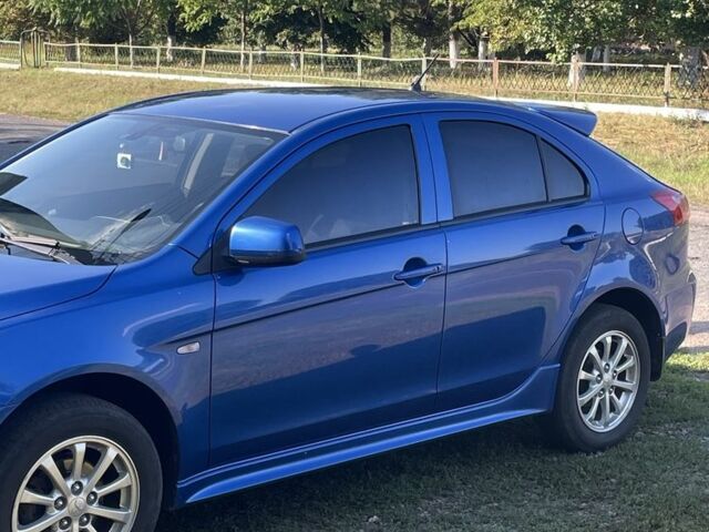 Синий Мицубиси Лансер, объемом двигателя 1.8 л и пробегом 228 тыс. км за 8300 $, фото 3 на Automoto.ua