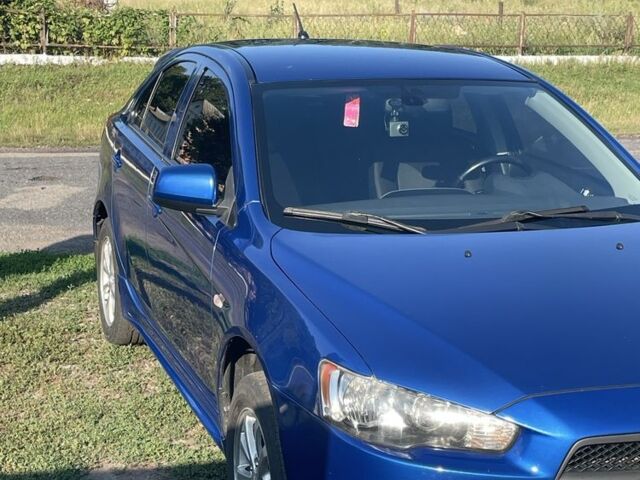 Синий Мицубиси Лансер, объемом двигателя 1.8 л и пробегом 228 тыс. км за 8300 $, фото 1 на Automoto.ua