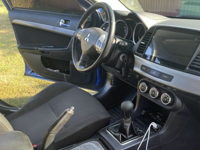 Синий Мицубиси Лансер, объемом двигателя 1.8 л и пробегом 228 тыс. км за 8300 $, фото 6 на Automoto.ua