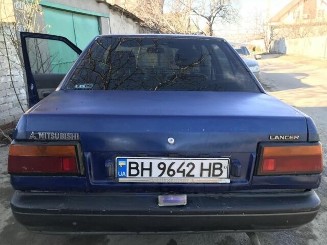 Синий Мицубиси Лансер, объемом двигателя 0 л и пробегом 322 тыс. км за 750 $, фото 1 на Automoto.ua