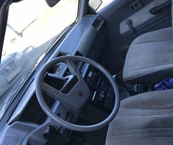 Синий Мицубиси Лансер, объемом двигателя 1.8 л и пробегом 322 тыс. км за 800 $, фото 5 на Automoto.ua