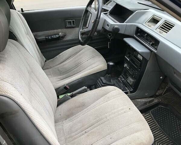 Синий Мицубиси Лансер, объемом двигателя 1.8 л и пробегом 322 тыс. км за 800 $, фото 7 на Automoto.ua