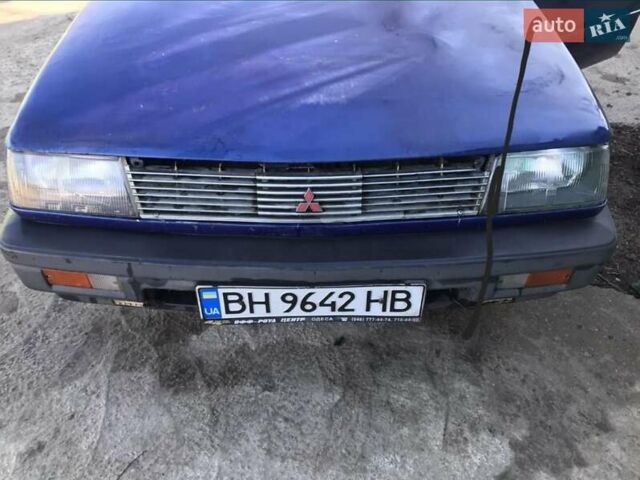 Синий Мицубиси Лансер, объемом двигателя 1.8 л и пробегом 322 тыс. км за 800 $, фото 4 на Automoto.ua
