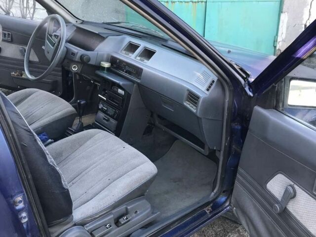 Синий Мицубиси Лансер, объемом двигателя 0 л и пробегом 322 тыс. км за 750 $, фото 2 на Automoto.ua