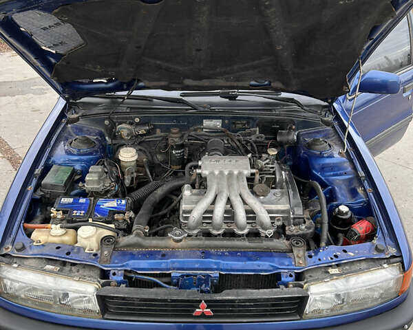Синий Мицубиси Лансер, объемом двигателя 1.8 л и пробегом 245 тыс. км за 3000 $, фото 38 на Automoto.ua