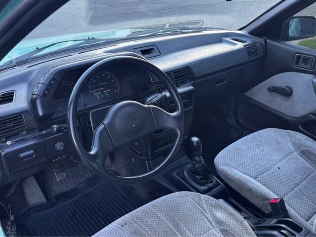 Синий Мицубиси Лансер, объемом двигателя 1.5 л и пробегом 300 тыс. км за 599 $, фото 11 на Automoto.ua