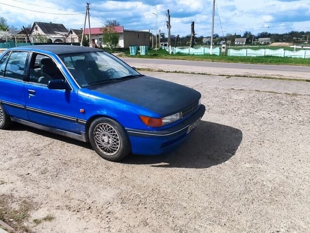 Синій Міцубісі Lancer, об'ємом двигуна 2 л та пробігом 37 тис. км за 850 $, фото 10 на Automoto.ua