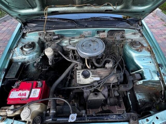 Синий Мицубиси Лансер, объемом двигателя 1.5 л и пробегом 300 тыс. км за 599 $, фото 14 на Automoto.ua