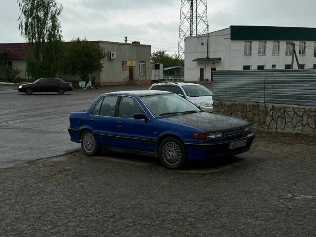 Синій Міцубісі Lancer, об'ємом двигуна 2 л та пробігом 37 тис. км за 850 $, фото 2 на Automoto.ua