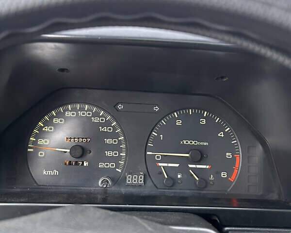 Синий Мицубиси Лансер, объемом двигателя 1.8 л и пробегом 245 тыс. км за 3000 $, фото 15 на Automoto.ua