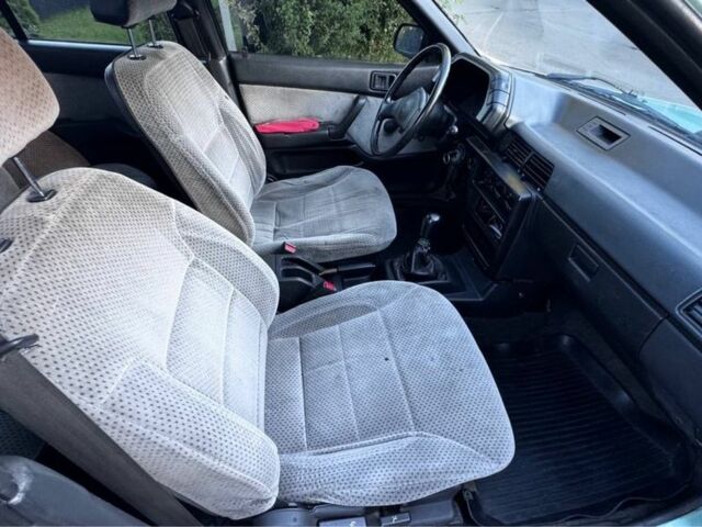 Синий Мицубиси Лансер, объемом двигателя 1.5 л и пробегом 300 тыс. км за 599 $, фото 12 на Automoto.ua