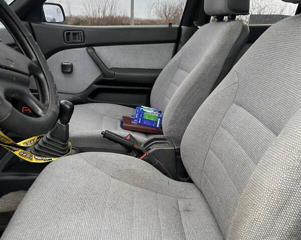 Синий Мицубиси Лансер, объемом двигателя 1.8 л и пробегом 245 тыс. км за 3000 $, фото 13 на Automoto.ua