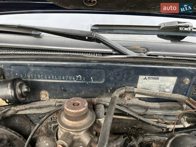 Синий Мицубиси Лансер, объемом двигателя 1.8 л и пробегом 245 тыс. км за 3000 $, фото 39 на Automoto.ua