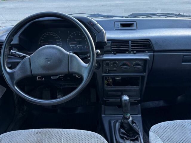 Синий Мицубиси Лансер, объемом двигателя 1.5 л и пробегом 300 тыс. км за 599 $, фото 10 на Automoto.ua