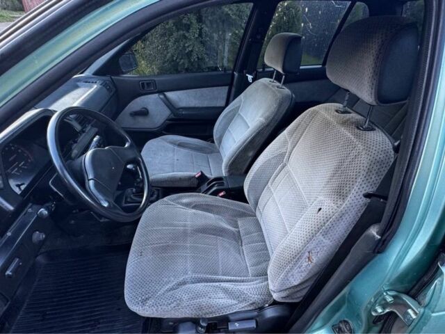 Синий Мицубиси Лансер, объемом двигателя 1.5 л и пробегом 300 тыс. км за 599 $, фото 17 на Automoto.ua