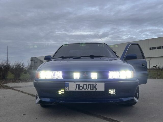 Синий Мицубиси Лансер, объемом двигателя 1.8 л и пробегом 245 тыс. км за 3200 $, фото 9 на Automoto.ua