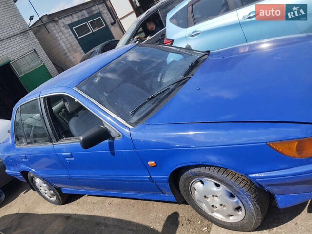 Синий Мицубиси Лансер, объемом двигателя 1.5 л и пробегом 300 тыс. км за 1300 $, фото 2 на Automoto.ua