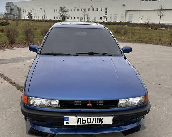 Синий Мицубиси Лансер, объемом двигателя 1.8 л и пробегом 245 тыс. км за 3000 $, фото 2 на Automoto.ua