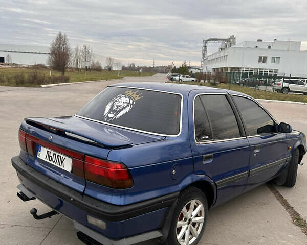 Синий Мицубиси Лансер, объемом двигателя 1.8 л и пробегом 245 тыс. км за 3000 $, фото 6 на Automoto.ua