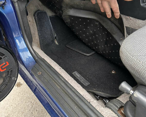 Синий Мицубиси Лансер, объемом двигателя 1.8 л и пробегом 245 тыс. км за 3000 $, фото 12 на Automoto.ua