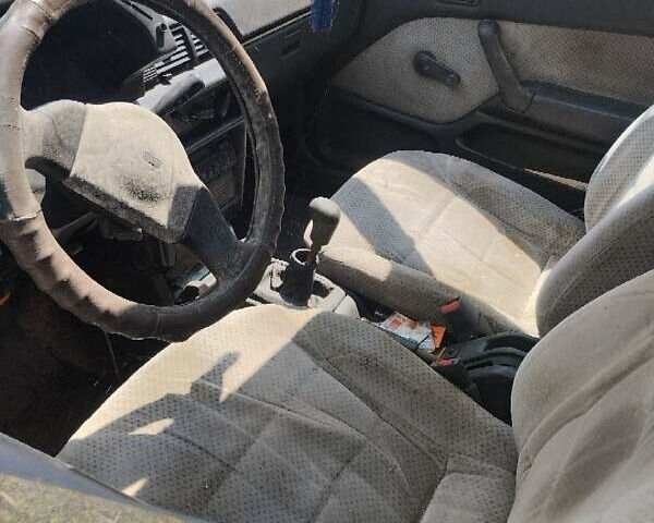 Синій Міцубісі Lancer, об'ємом двигуна 1.3 л та пробігом 100 тис. км за 700 $, фото 4 на Automoto.ua