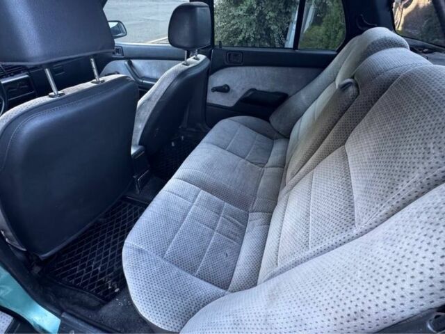 Синий Мицубиси Лансер, объемом двигателя 1.5 л и пробегом 300 тыс. км за 599 $, фото 18 на Automoto.ua