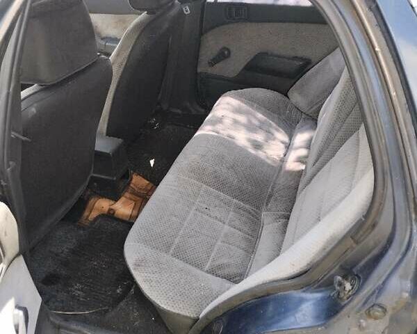 Синій Міцубісі Lancer, об'ємом двигуна 1.3 л та пробігом 100 тис. км за 700 $, фото 6 на Automoto.ua