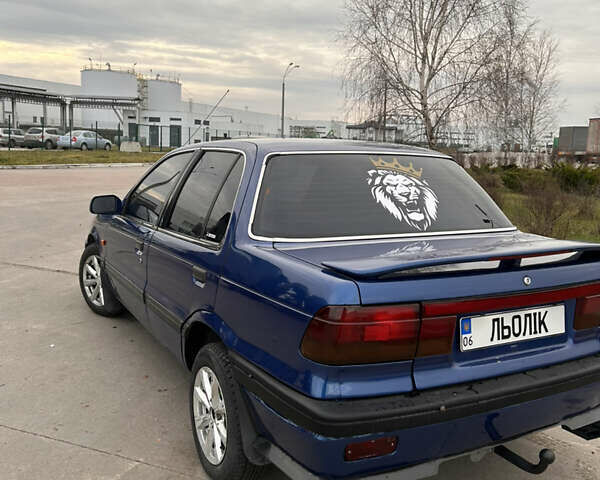 Синий Мицубиси Лансер, объемом двигателя 1.8 л и пробегом 245 тыс. км за 3000 $, фото 8 на Automoto.ua