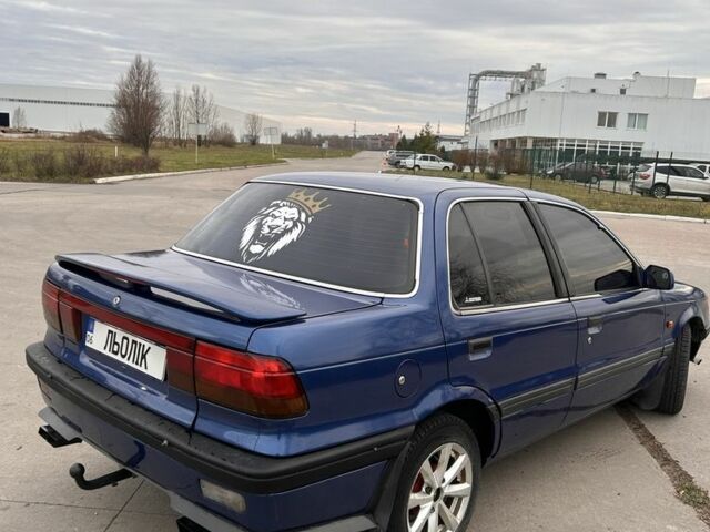 Синий Мицубиси Лансер, объемом двигателя 1.8 л и пробегом 245 тыс. км за 3200 $, фото 1 на Automoto.ua