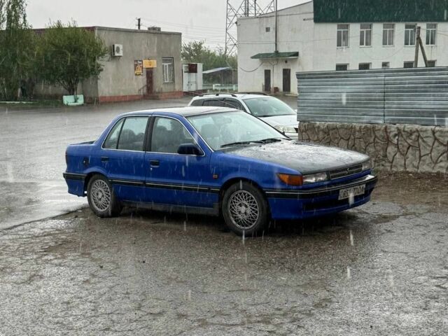 Синій Міцубісі Lancer, об'ємом двигуна 2 л та пробігом 37 тис. км за 850 $, фото 1 на Automoto.ua